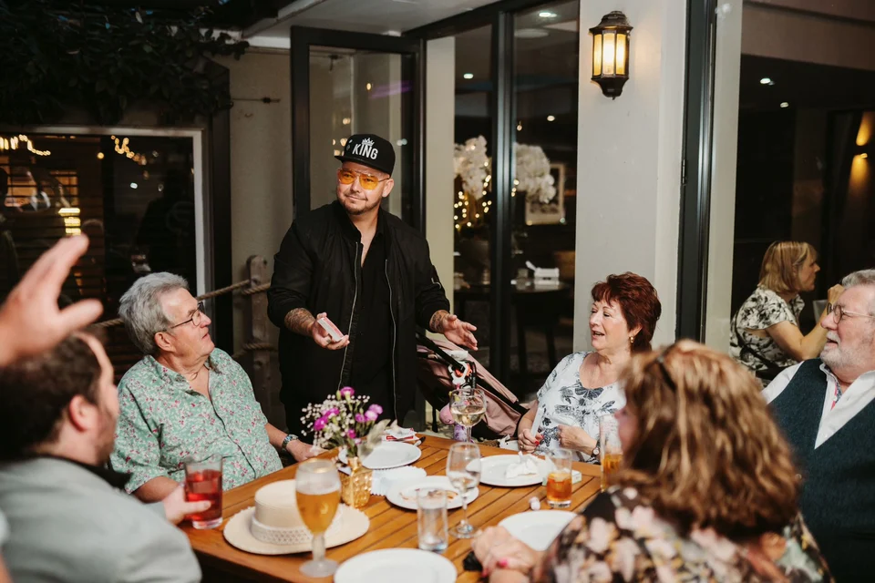 Phil Pearson entertaining guests at a corporate event