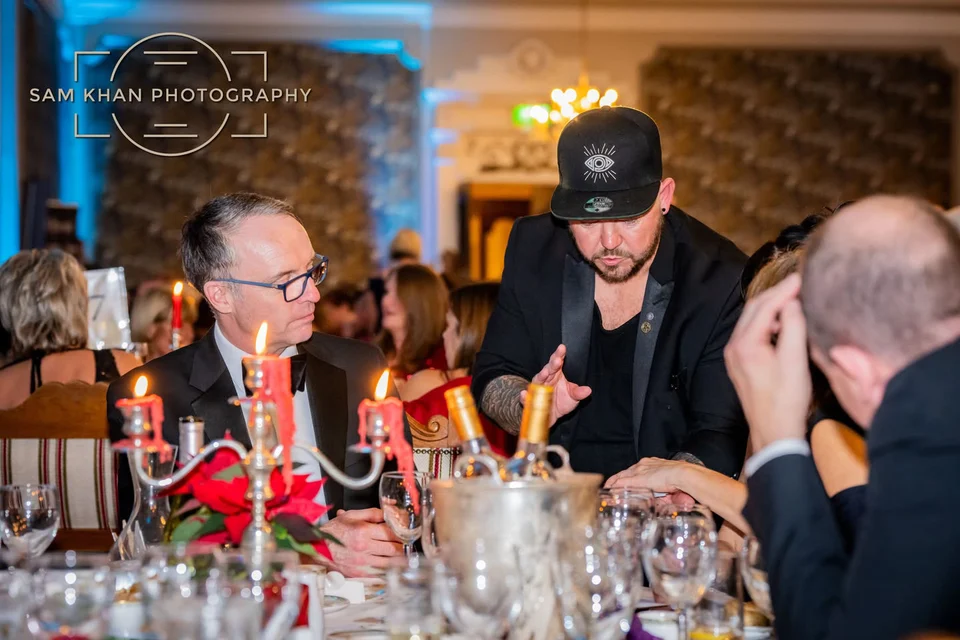 Phil Pearson performing corporate magician