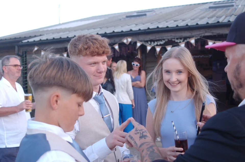 Phil performing for guests at a wedding