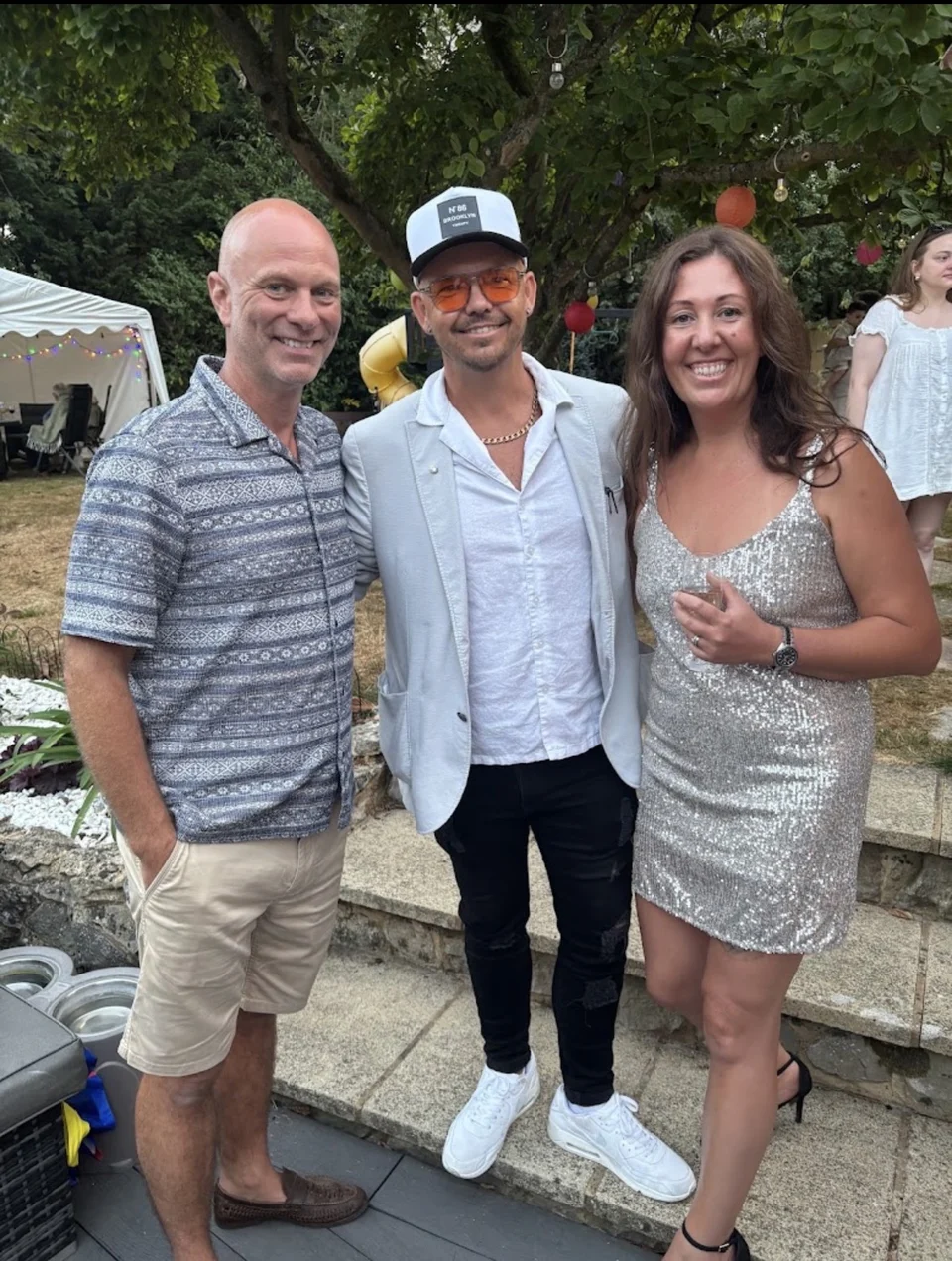 Phil with clients outdoors after an event