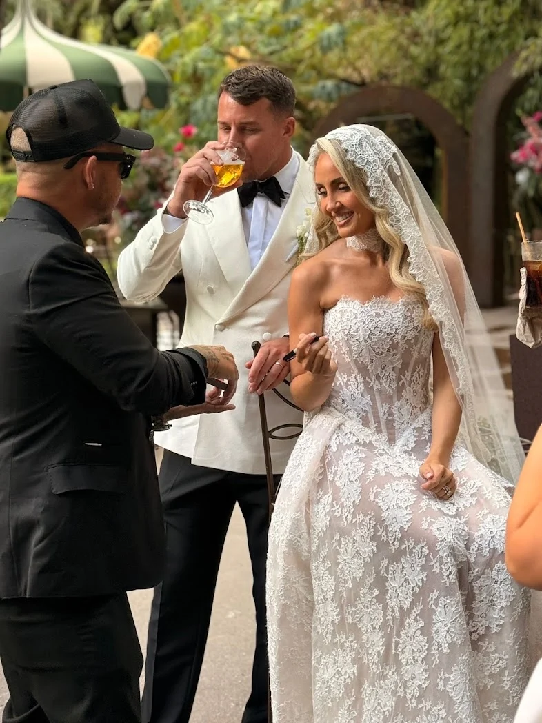Phil performing for a bride and groom outdoors