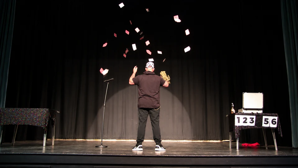 Phil Pearson performing visual magic on stage