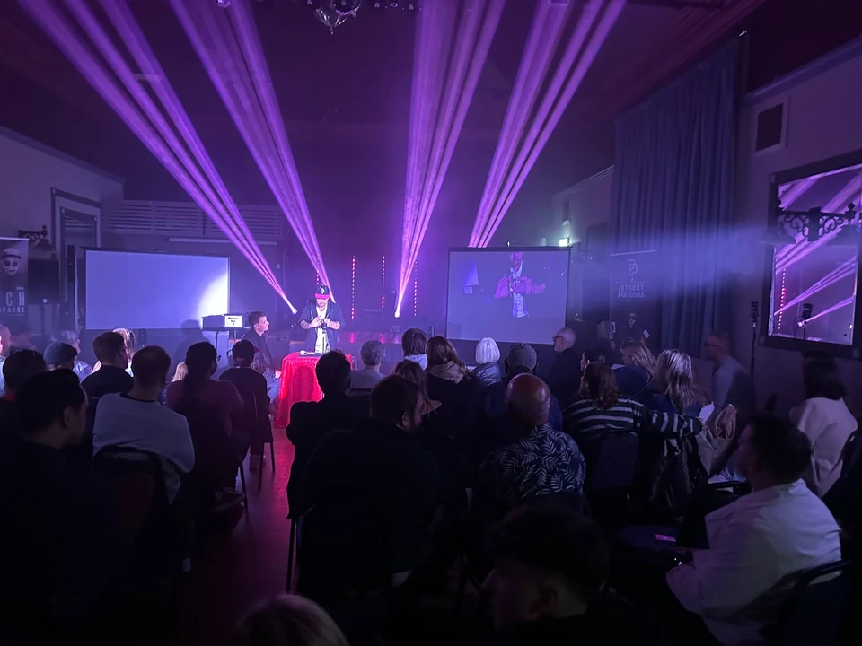 Phil Pearson performing stage magician